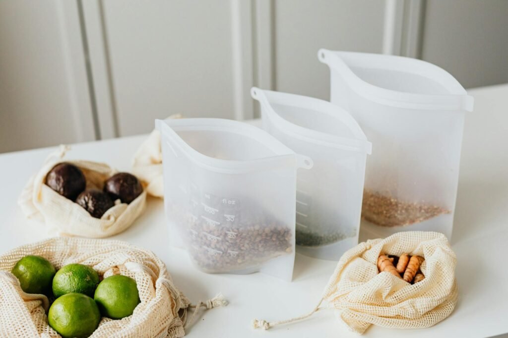 Small frozen avocado portions in labeled bags and silicone trays