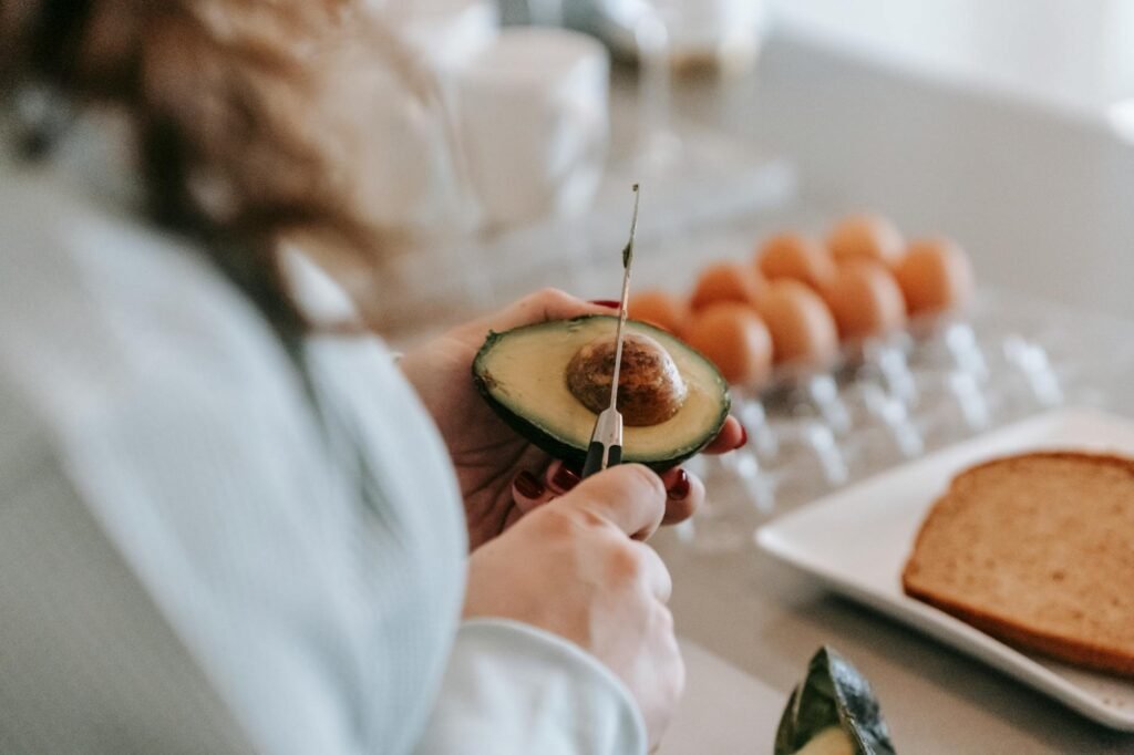 Cut avocado stored in a container to reduce waste